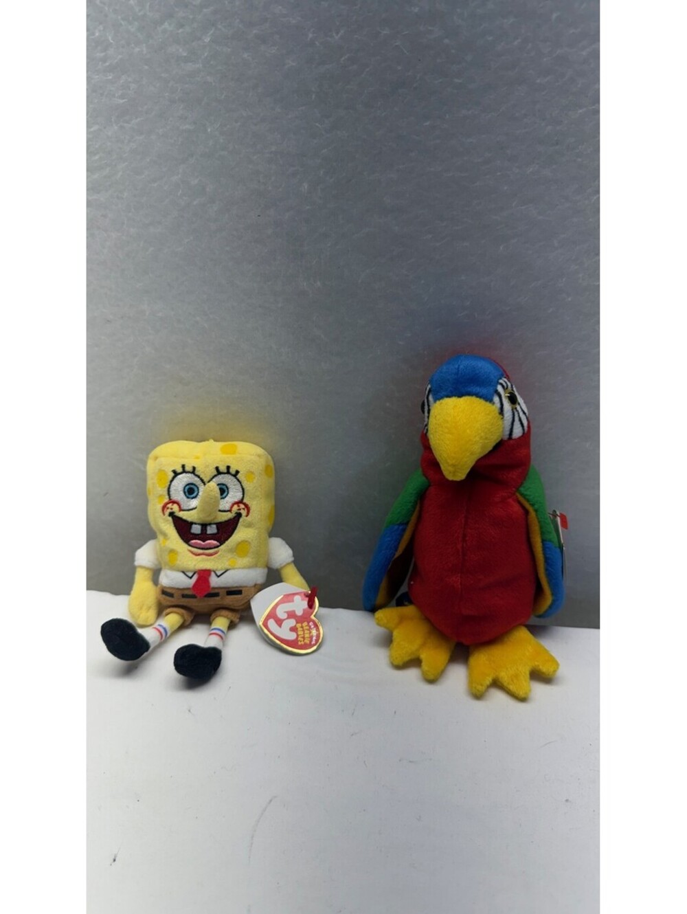 Lot of 2 Ty Beanie Babies: SpongeBob SquarePants & Jabber Parrot Plush Toys